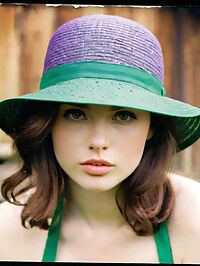 A 20 year old woman in 1960s style dons apron and hats amidst early morning rustic solitude